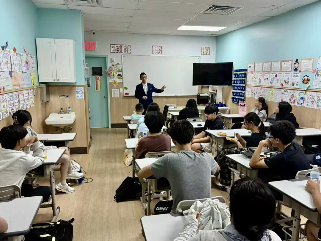 A Myopia Charity speaker teaching a classroom of students about myopia
