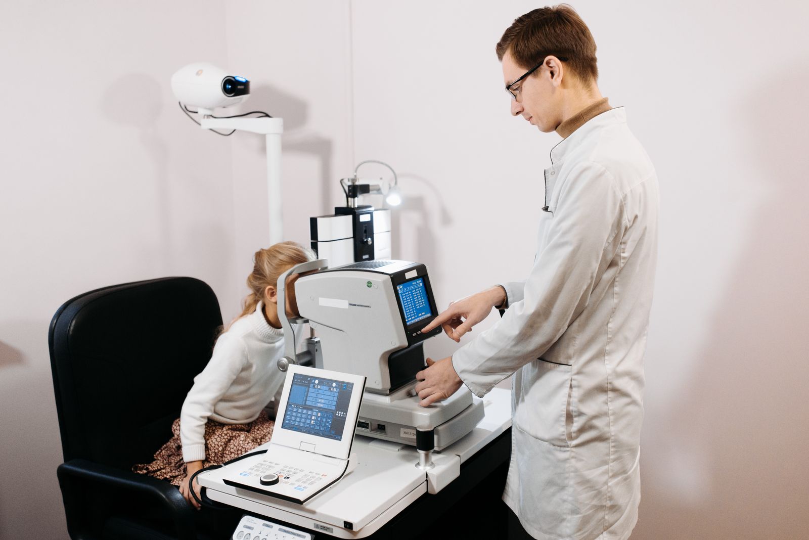 A child receiving an eye examination